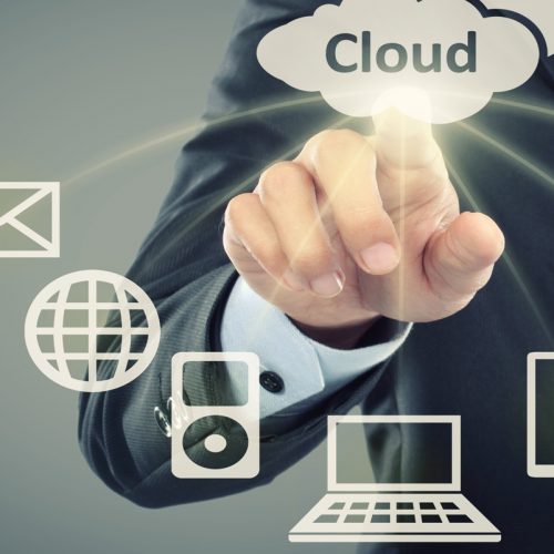 Business Man Pointing At Cloud Computing